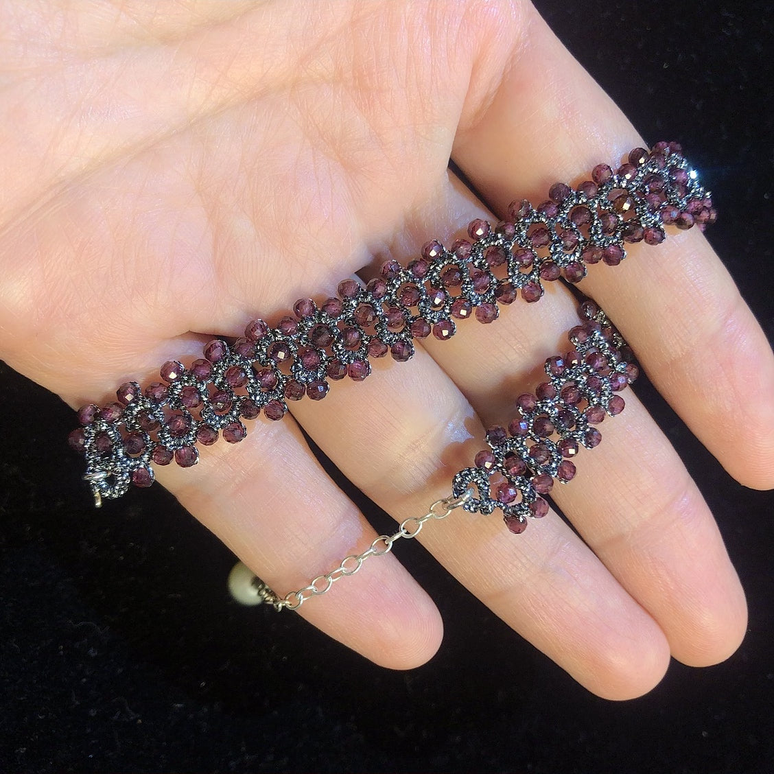 Handmade tatting bracelet with garnet beads