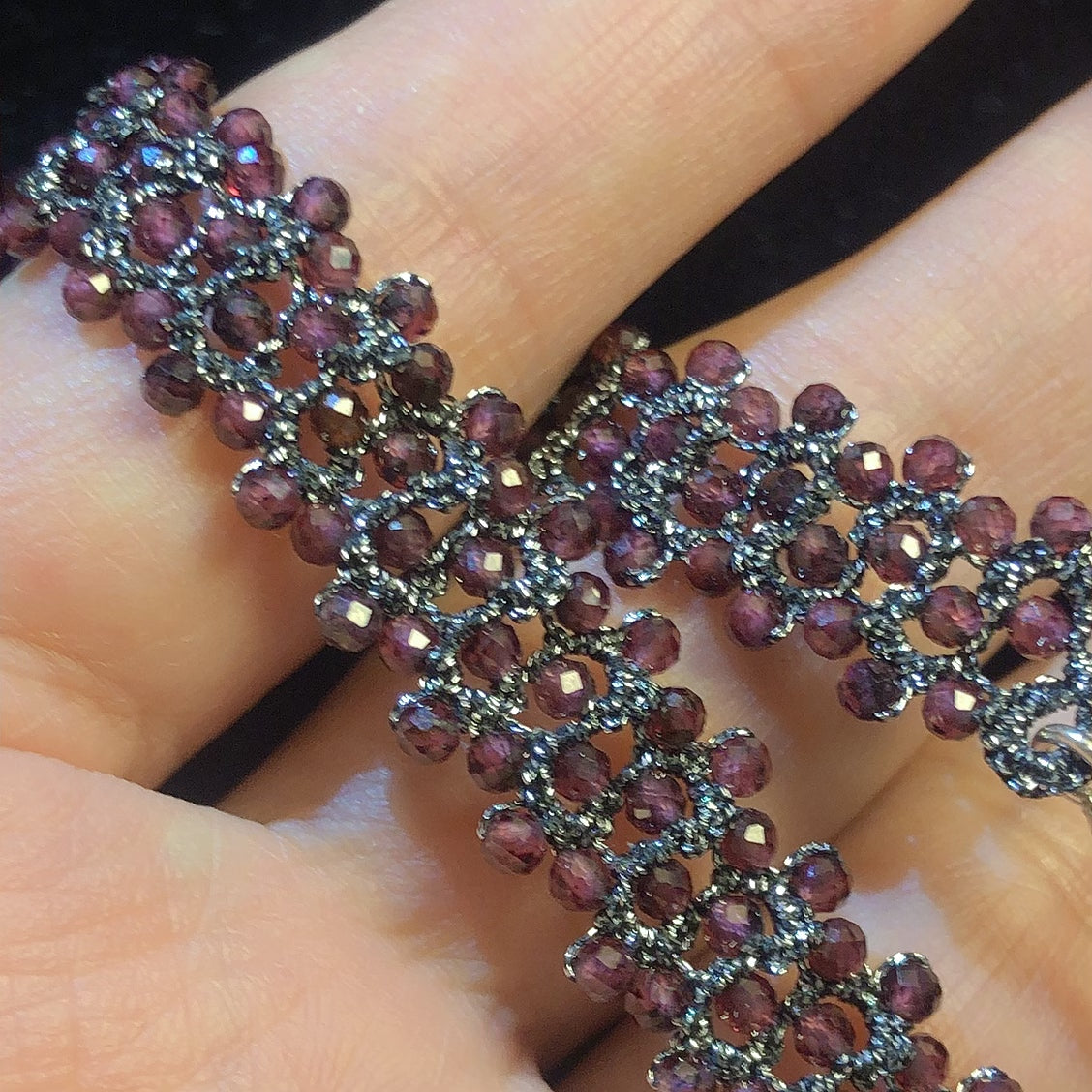 Handmade tatting bracelet with garnet beads