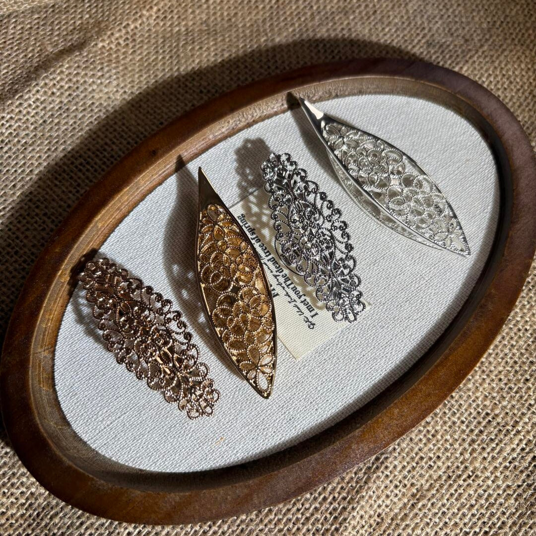 Delicate hollowed-out metal shuttle 78*20*10mm