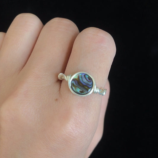 Handmade wirewrapped abalone shell rings