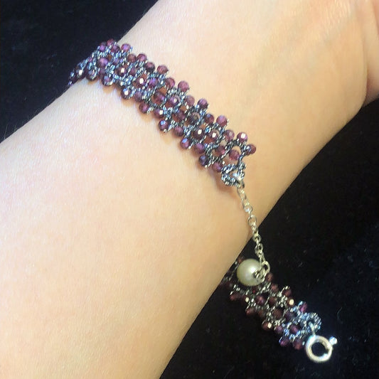 Handmade tatting bracelet with garnet beads
